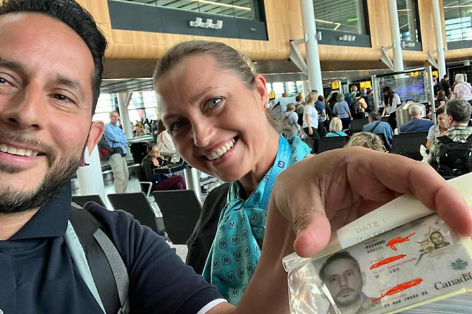 Pizarro poses with the flight attendant who brought him his PR card.
