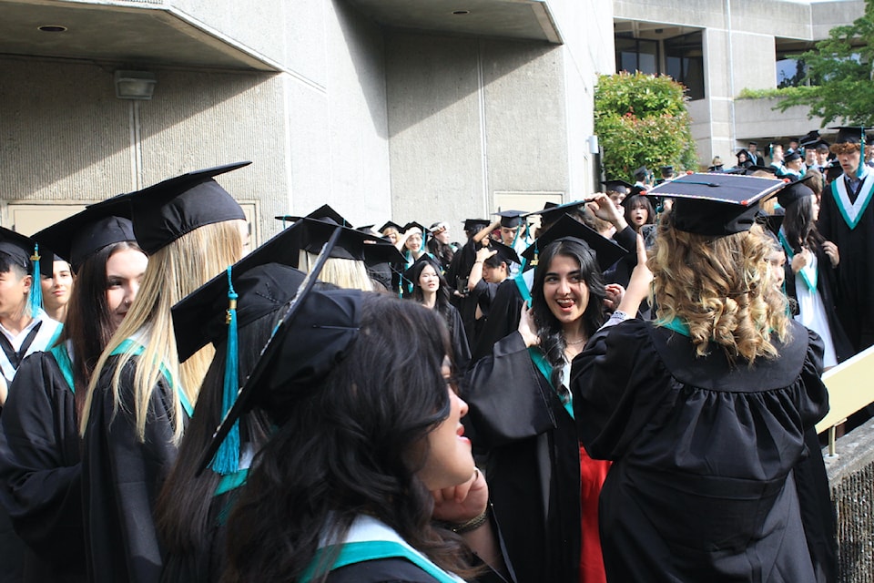 2025 Oak Bay grads gather at UVic for their convocation ceremony.