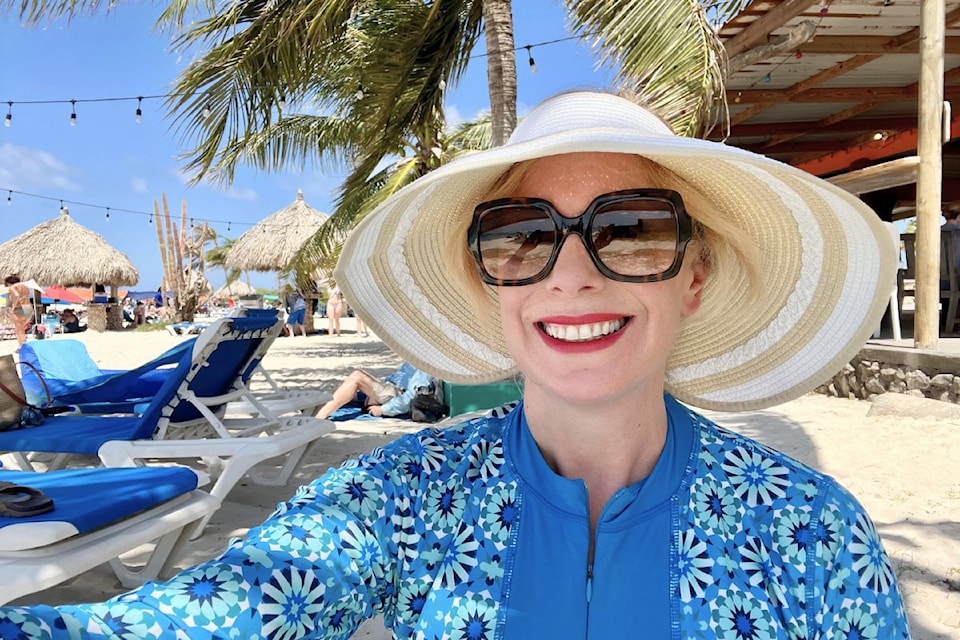 Tess van Straaten at Arashi Beach in Aruba, a popular beach known for its calm waters, white sand, and being a great spot for snorkelling.