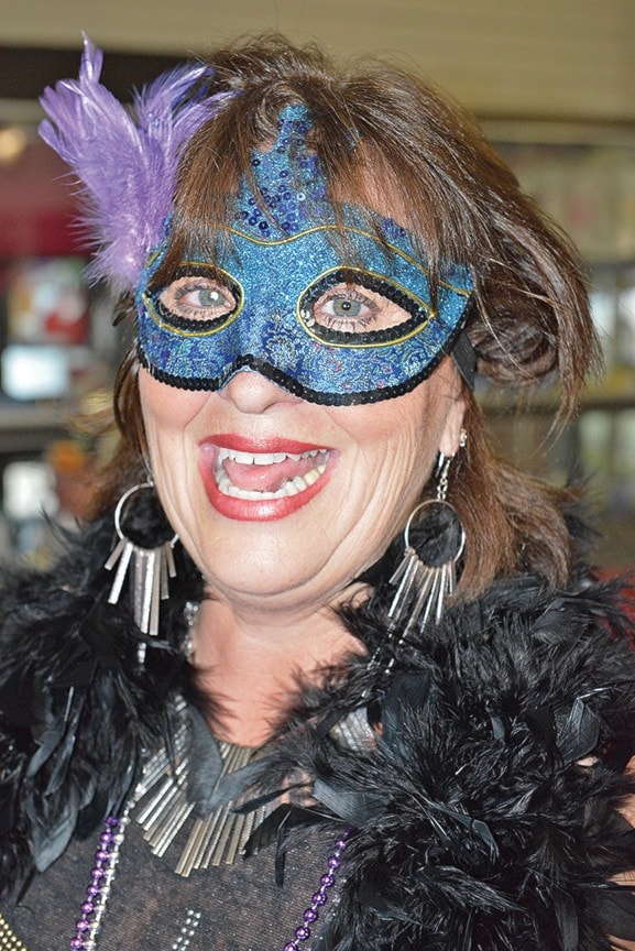 Steve Sharlow photo
Rotarian Lorna Curtis ready for enjoying the Mardi Gras