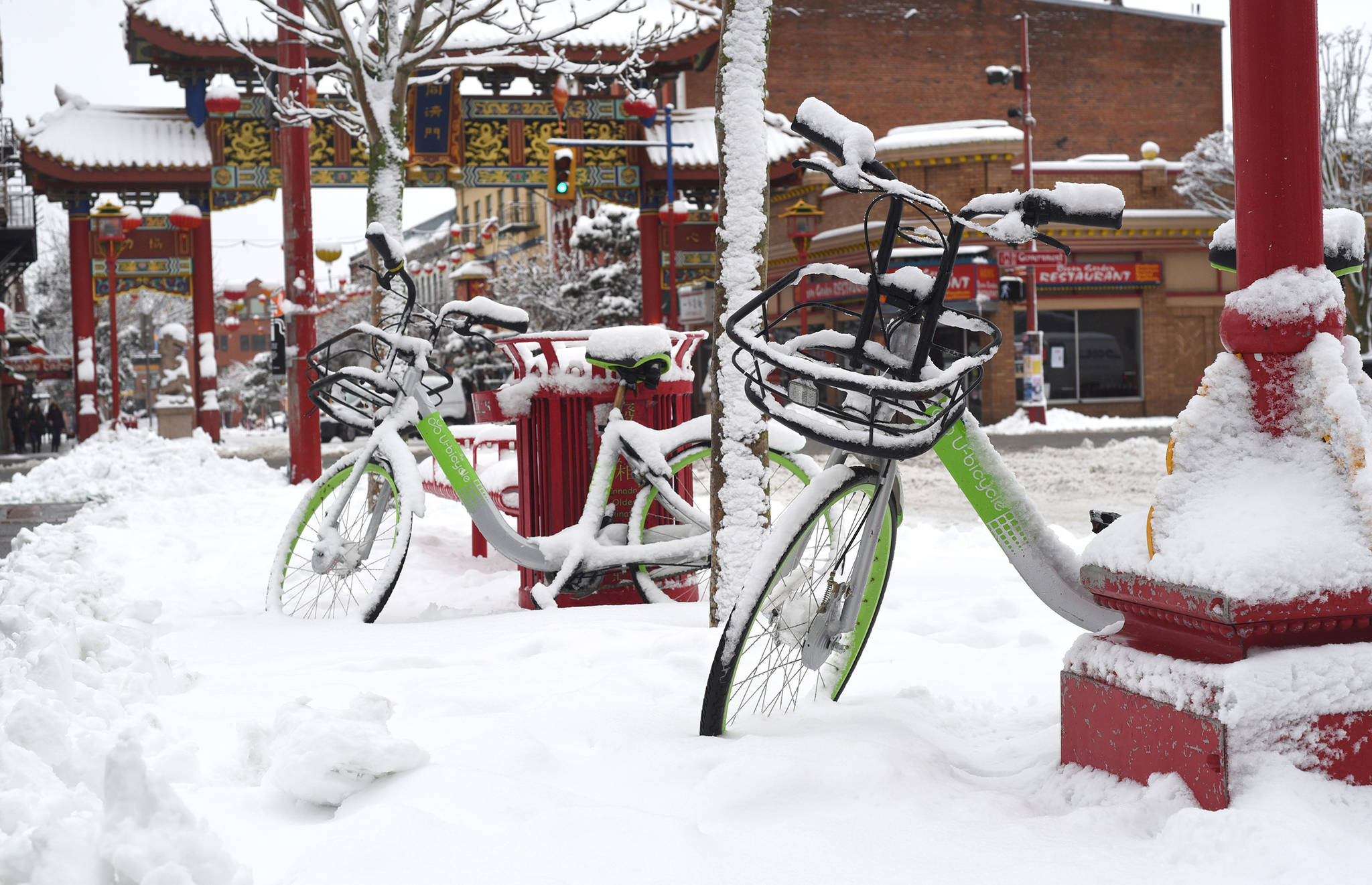 15514994_web1_Chinatown-Snow-Covered-Bikes