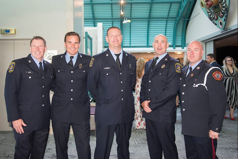 From left to right: Victoria firefighters Jamie Lund, Colin Anderson, Steve Lester, Shaun Collard and Maple Ridge firefighter Lance Sherman pose before the second annual Gala for Hope at Carson Hall Saturday night. (Nina Grossman/News Staff)