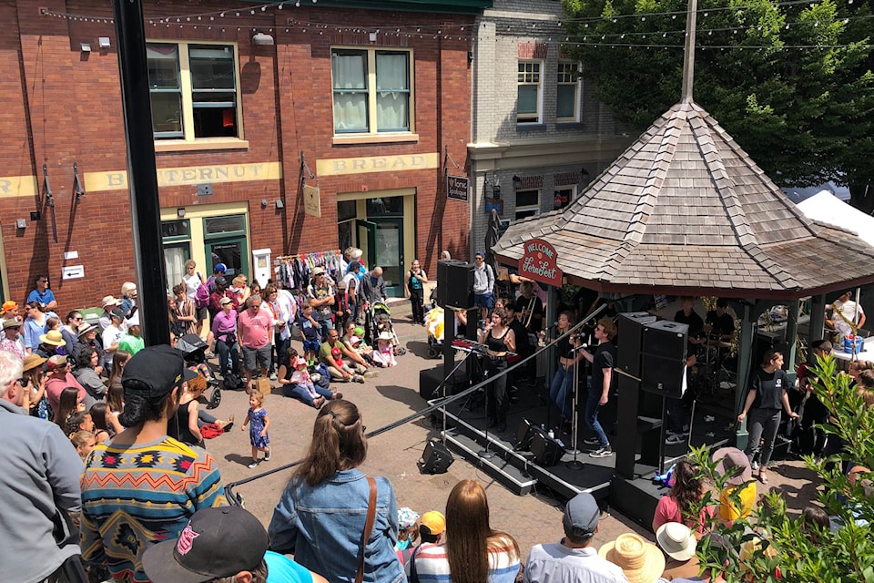 Fernwood Square sits packed with people taking in live music at day two of the 24th annual FernFest on Saturday, June 22, 2019. (Kevin Menz/News Staff)