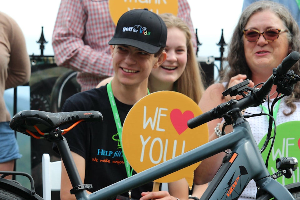 Jonathan Gingras was nothing but smiles after his dream was filled in the form of a new electric bicycle. His is one of many dreams being filled due to the Golf for Kids Charity Classic. (Shalu Mehta/News Staff)