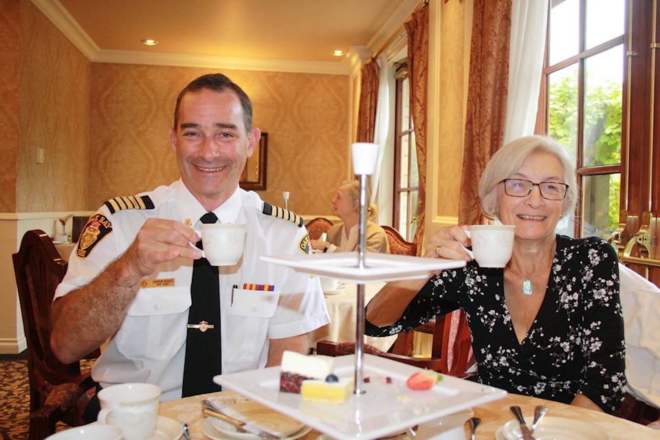 Oak Bay Fire Chief Darren Hughes and Cheryle Scott at the fifth annual Oak Bay News Afternoon Readers Tea in the Carlton House. (Travis Paterson/News Staff)