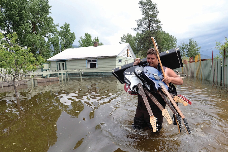 20878286_web1_190709-RDA-Canada-Grand-Forks-Flood-Victims-PIC