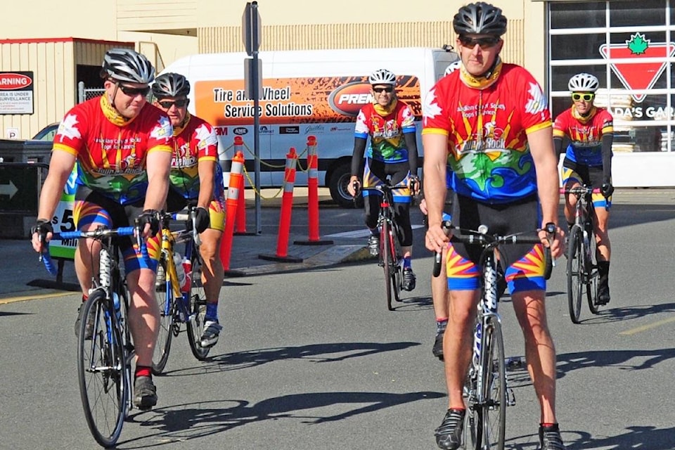 The team of riders of 2020 the Cops for Cancer Tour de Rock make their way to Save-On-Foods in Parksville on Friday, Sept. 25, 2020. (Michael Briones photo)
