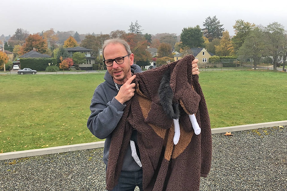 Monterey Middle School principal Ken Andrews with the wooly mammoth onesie he will wear when he sleeps on the roof of the school, but only if the student-led fundraising campaign can also reach $6,500 by Remembrance Day. (Travis Paterson/News Staff)