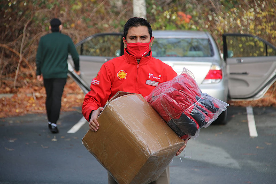Sweetpal Chauhan, operator of several Shell Gas stations in Greater Victoria, donated 100 jackets and 100 sleeping bags to Our Place on Friday. (Kendra Crighton/News Staff)