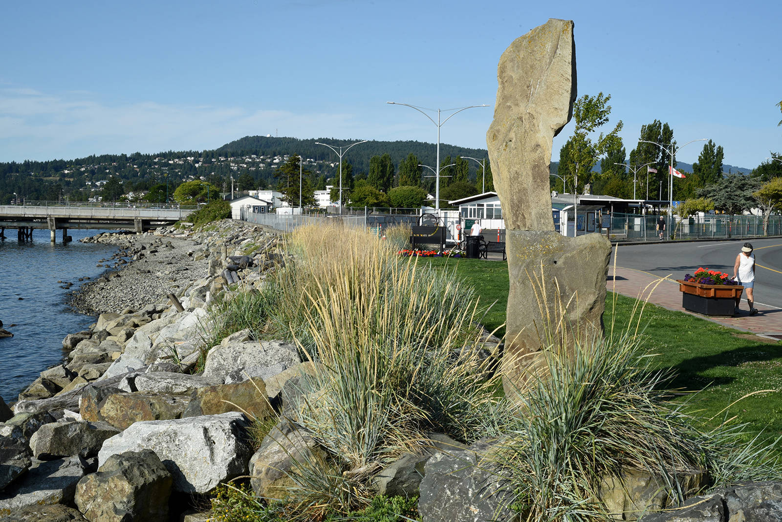 The granite sculpture <em>The Keeper</em> stands guard along the Sidney waterfront. Don Denton photo
