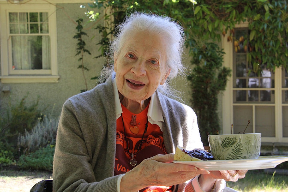 Marion Cumming offers bannock and jam with B.C. cherries for mid-morning tea. (Christine van Reeuwk/News Staff)