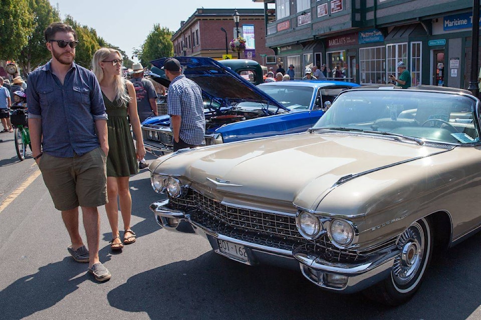 Crowds check out some of the classic cars on display at a past Oak Bay Collector Car Festival. (Black Press Media file photo)