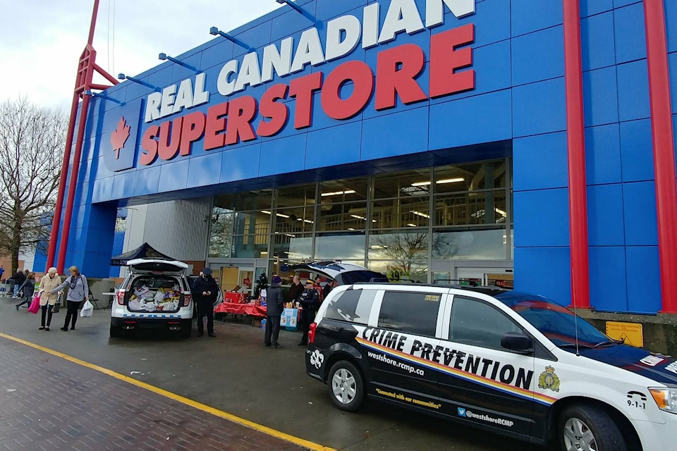 27466711_web1_211209-GNG-RCMP-food-drive-twitterpic_1