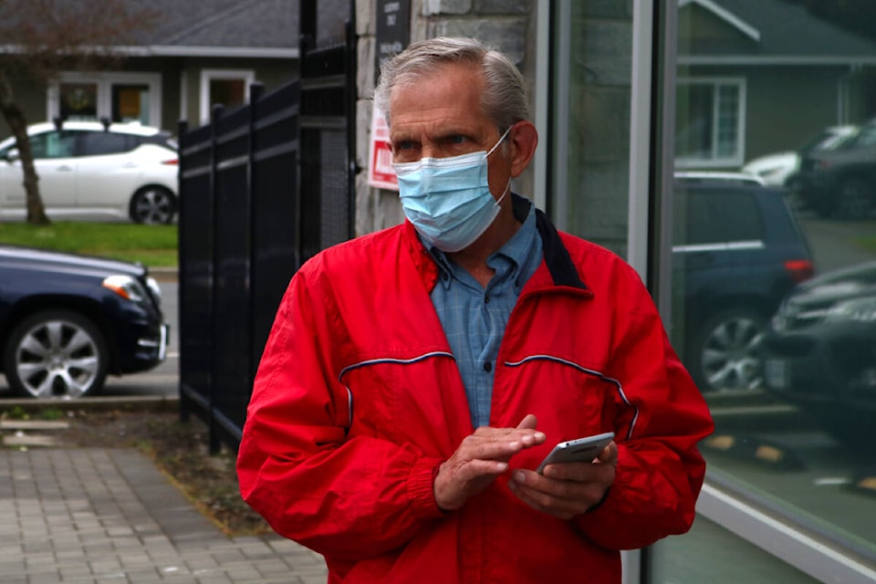 Richard Demontigny outside Premier John Horgan’s Langford constituency office where he’d expected to be arrested, but no one was there. Demontigny later turned himself into the West Shore RCMP office. (Bailey Moreton/News Staff)