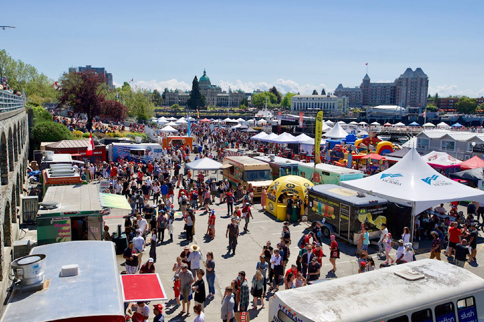 Victoria’s Inner Harbour was packed Friday as crowds gathered to celebrate the return of in-person Canada Day activities with live music, food, and vendors. (Justin Samanski-Langille/News Staff)