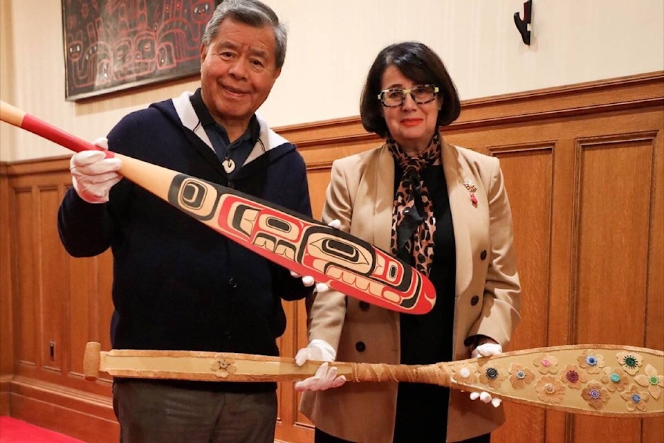 Paddles were installed by Lt.-Gov. Janet Austin and T’esots’en, Patrick Kelly, a member of the award selection committee, on Nov. 22, kicking off the call for nominations for the 2023 B.C. Reconciliation Awards. (Courtesy of the Office of the Lieutenant Governor of British Columbia)