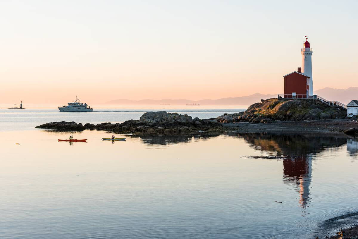 Kayaking near Fisgard Lighthouse National Historic Site. Credit: Destination BC/Reuben Krabbe