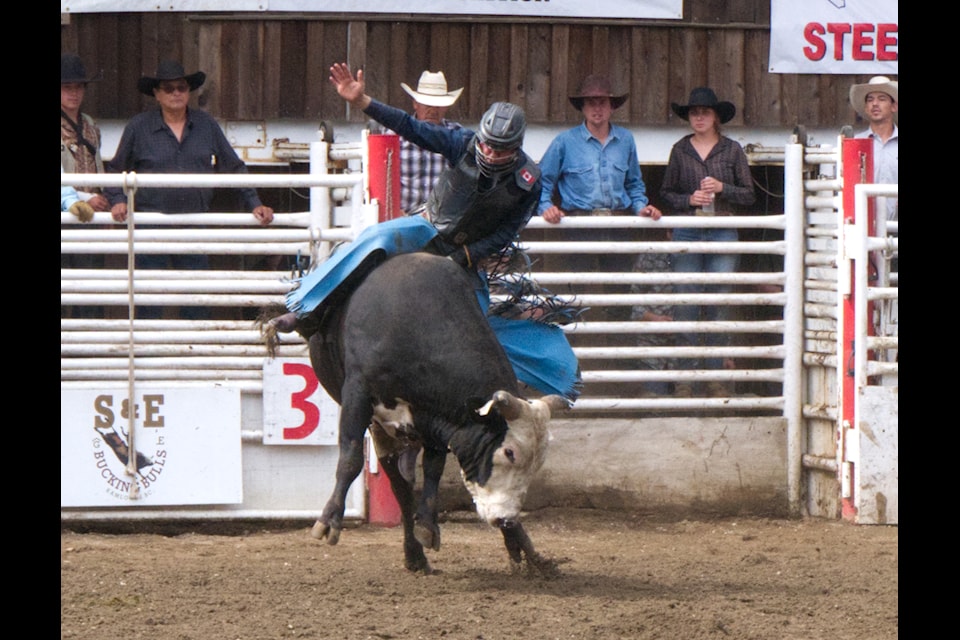 Hunter Sippola rides during the Bulls, Broncs and Barrels at the Coombs Rodeo Grounds on Aug. 18.