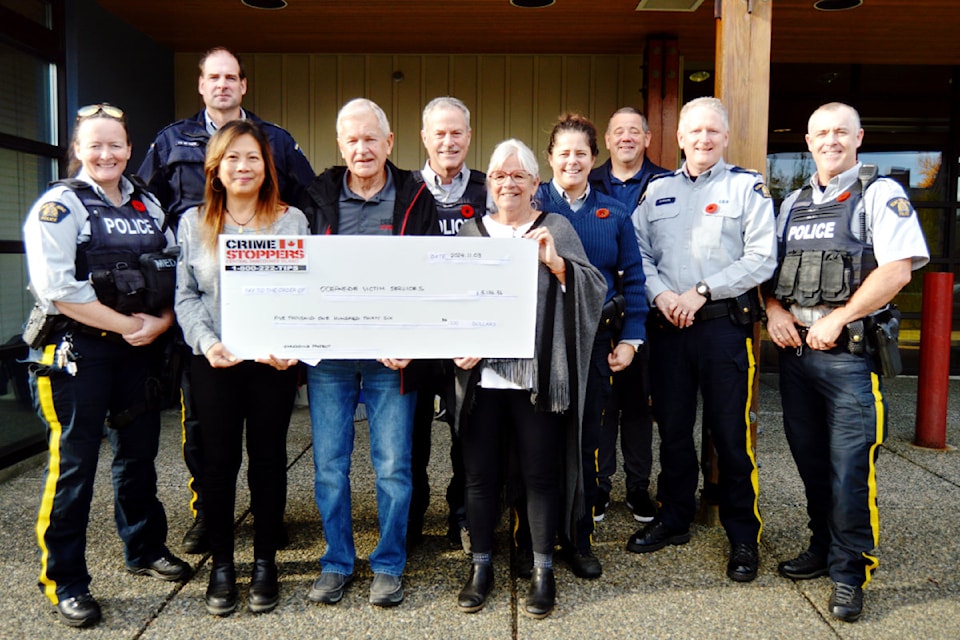 24113-pqn-crimestoppersdonation3