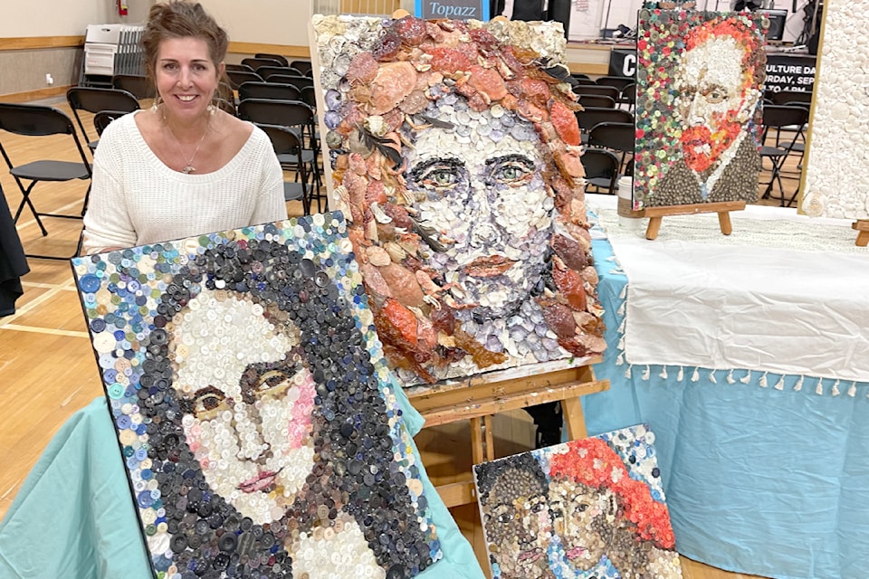 Artist Nola Fielding shows her shell and button mosaic art. (Michael Briones photo)