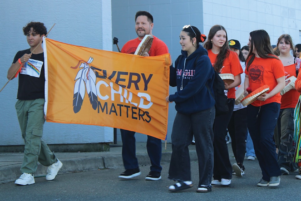 Students and staff at Ballenas Secondary School marked Orange Shirt Day and Truth and Reconciliation Day with a march on Sept. 27.