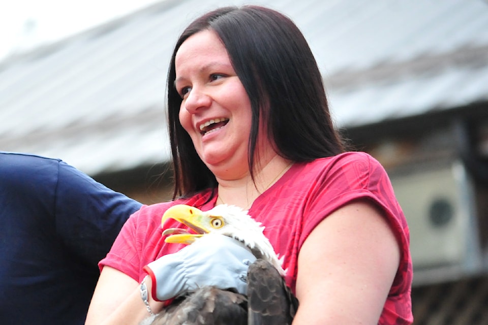 Alison Wale couldn't contain her feelings as she cradled a rehabilitated eagle that was nursed back to health at the North Island Wildlife Recovery Centre and released back to the wild.