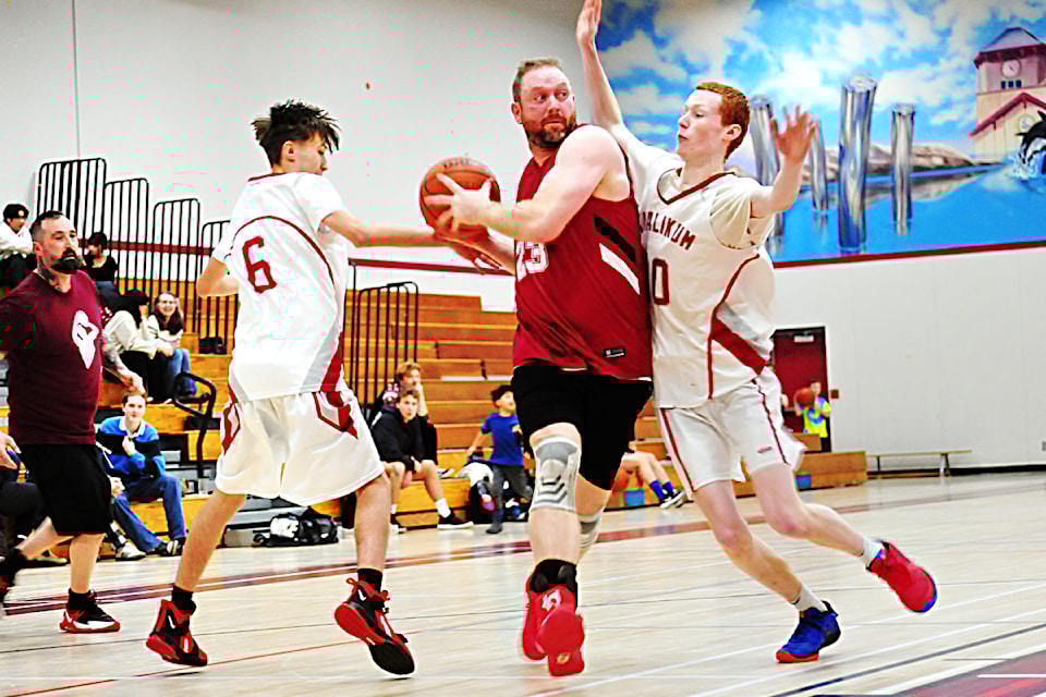 Glory Days guard Taylor Wilson barrels his way through the defence of the Kwalikum Kondors.