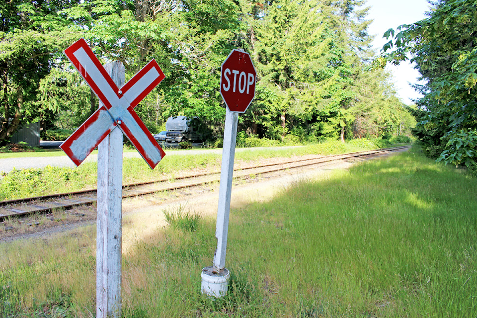 Qualicum Beach wants stop signs at railway crossings taken down.