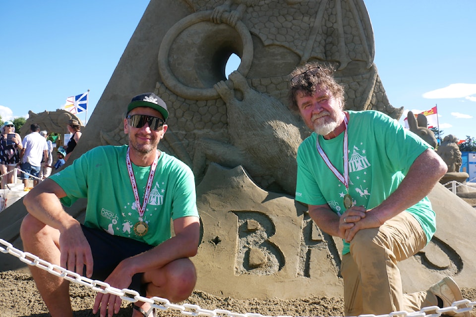 Jakub Zimacek from the Czech Republic (left) and Canadian Fred Dobbs took first place in the doubles event of the 2025 Quality Foods Sand Sculpting Competition in Parksville on July 13.