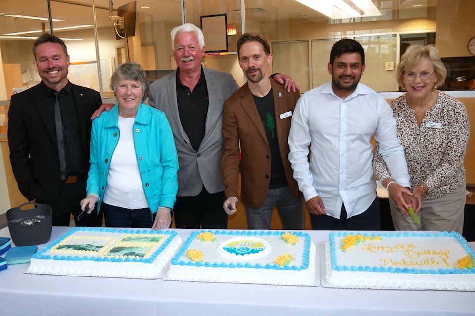 Mayor and council cut the 80th birthday cake for the City of Parksville during a celebration on June 19. From left: Coun. Sean Wood, Coun. Mary Beil, Mayor Doug O'Brien, Coun. Joel Grenz, Coun. Amit Gaur and Coun. Sylvia Martin.