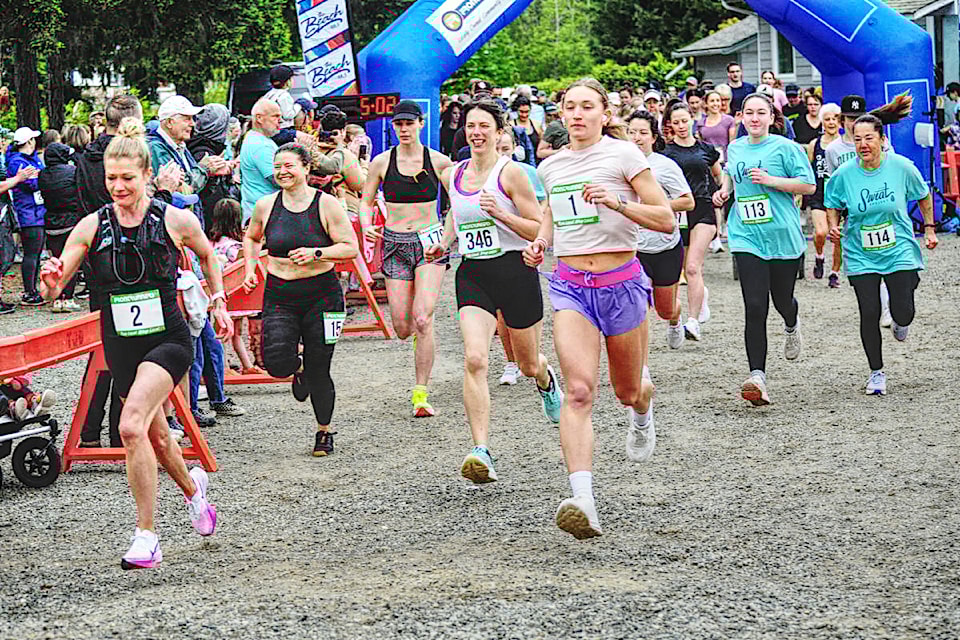 The top two finishers in the 5K race Kate Cook (2) of Nanaimo and Samantha Wright of Campbell River (1) get off to a flying start.