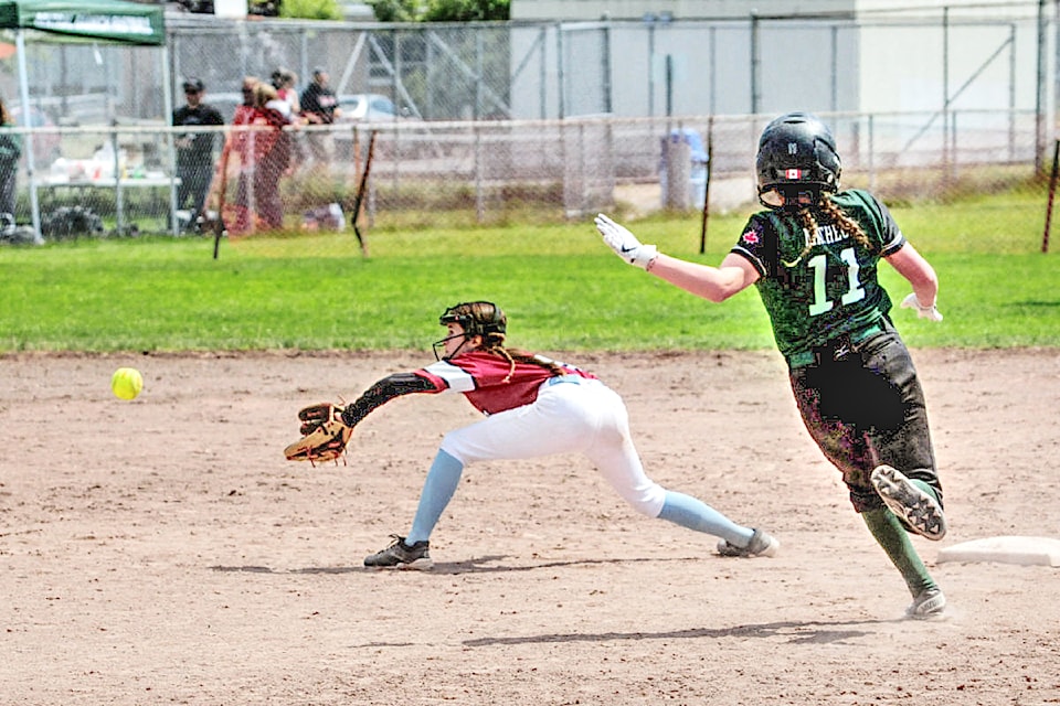 Central Vancouver Island Rage infielder Kamryn Cox gets down low to catch a throw.  