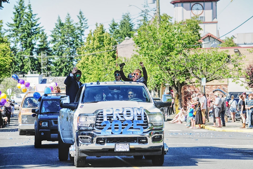 The Kwalikum Secondary School Class of 2025 held their parade in town on a sunny and hot Saturday afternoon.