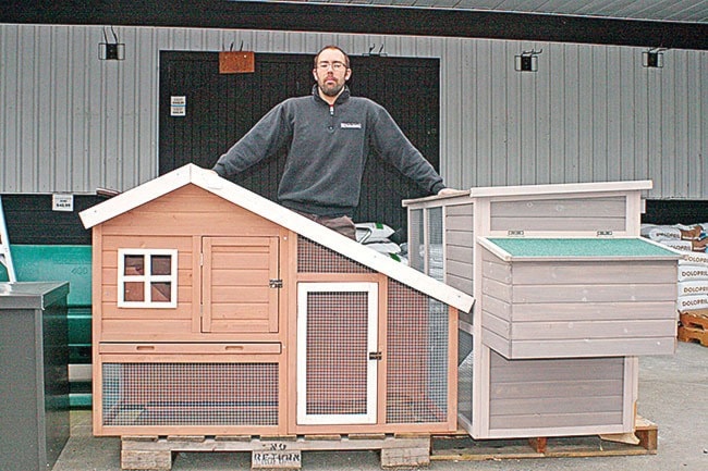 NEWS File photo
Eric Petersen of Buckerfield's with some urban chicken coops.
