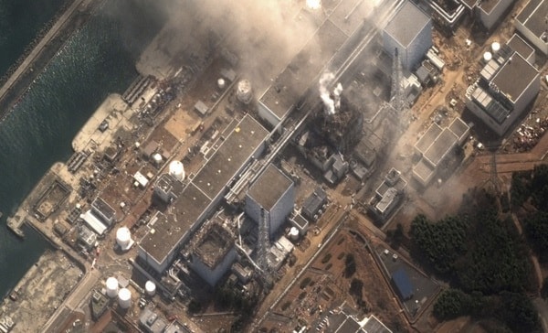 Handout satellite image of Fukushima Daiichi nuclear plant at Minamisoma after earthquake and tsunami