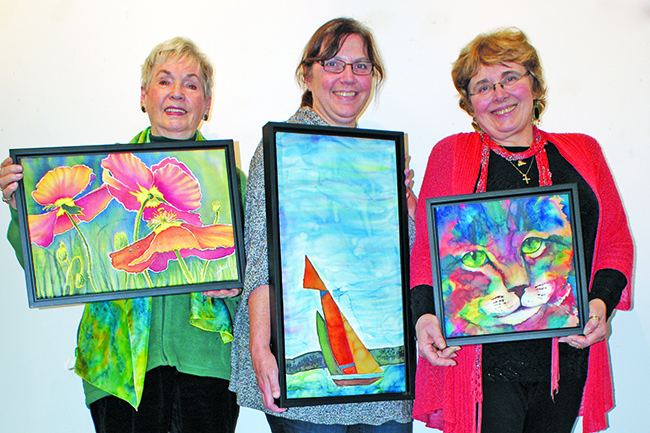 Silk Worm Art Group paints on silk to produce stained-glass effect