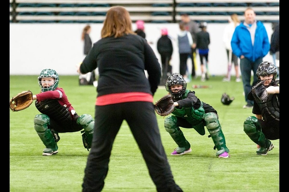 web1_170327-PQN-M-softball-catchers-jr-march26