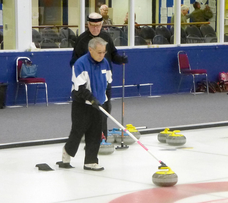 14574960_web1_StickCurling