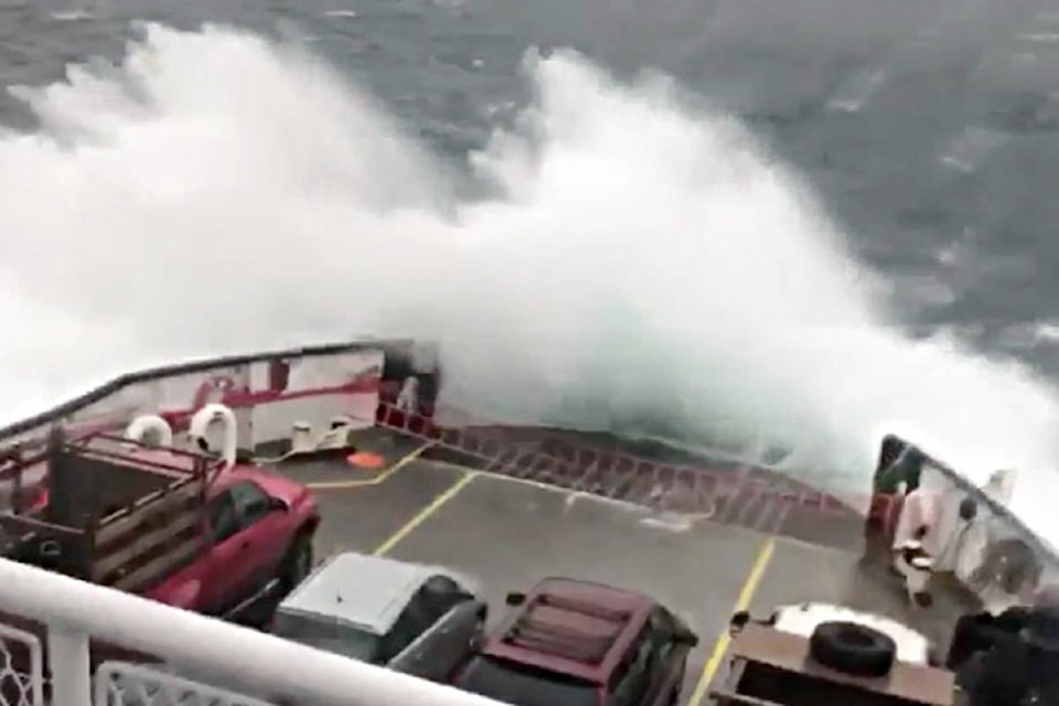 A giant wave covered the vehicle deck of the Quadra Island-Campbell River ferry during a stormy crossing on Wednesday. Screengrab from video recorded by ferry passenger Bubba Muldoe