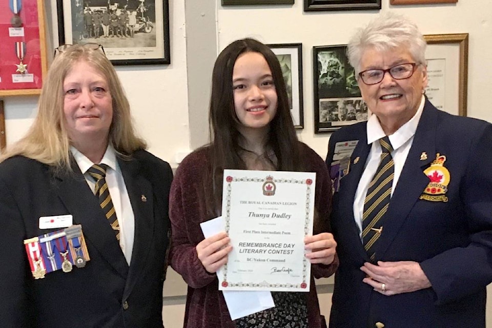 Thunya Dudley was presented with first place certificate for winning the intermediate poem competition of the 2020 Royal Canadian Legion Remembrance Contest by Parksville Legion Branch 49 by president Gale Mossman, right, and Poppy Zone chair Michelin Sen. (Submitted photo)