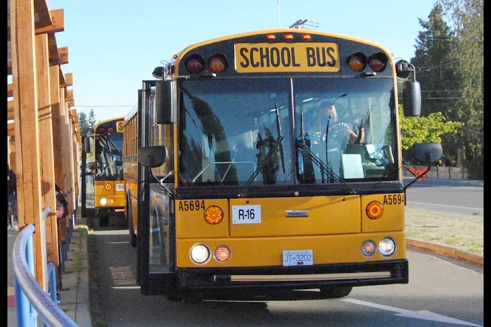 School buses were busy transporting students for the first day of school in SD69 (Qualicum) on Thursday, Sept. 10). (Michael Briones photo)