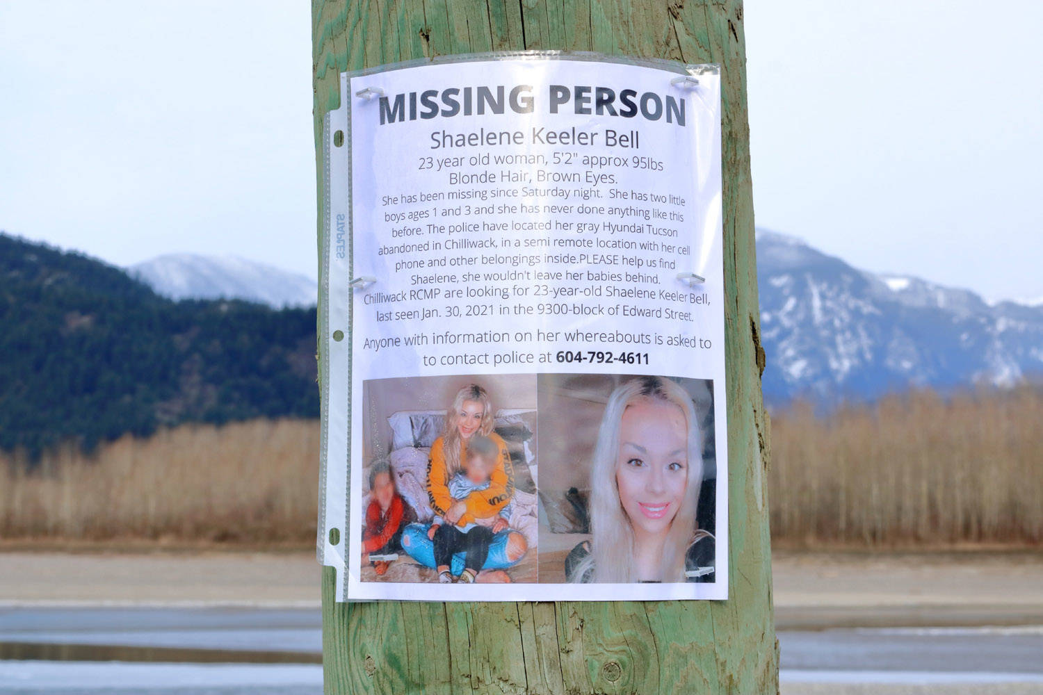 A poster for missing Chilliwack mom, Shaelene Bell, is seen by the Fraser River on Sunday, Feb. 14, 2021. (Eric Buermeyer)