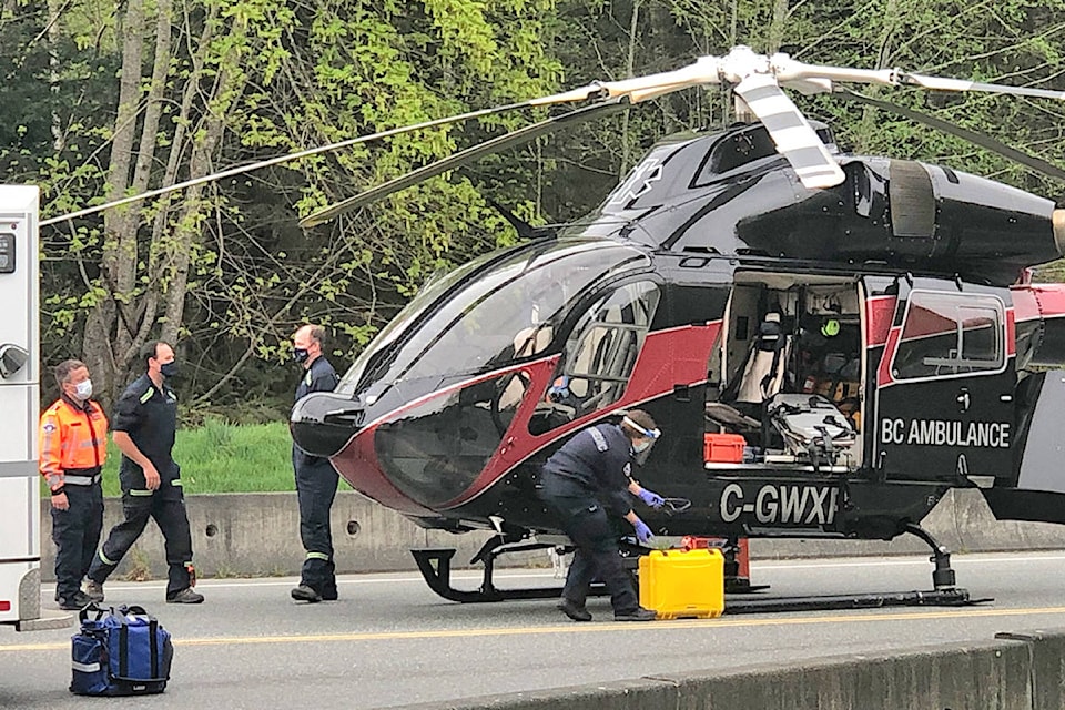 An air ambulance touched down at approximately 1 p.m. on Friday, April 23, along Laburnum Road in Qualicum Beach to retrieve a burn victim. (Michael Briones photo)