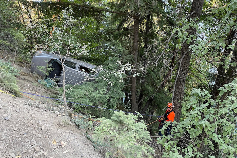 A Comox Valley Search & Rescue team member checks the area around the van for occupants. Photo courtesy Comox Valley Search & Rescue.