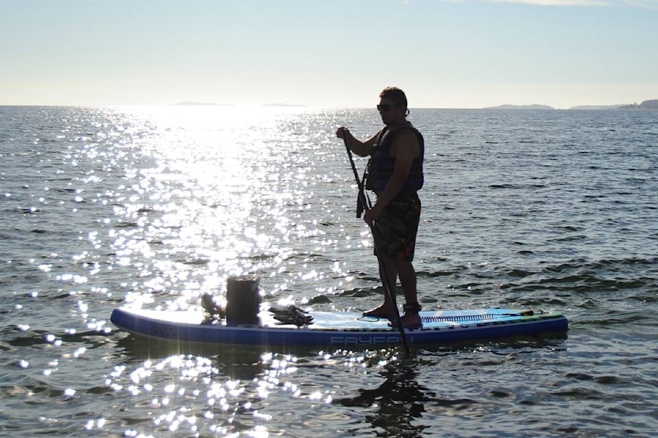 26131188_web1_210818-PQN-Cooling-Spaces-Offered-paddleboarder_1