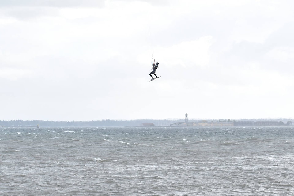 More than a dozen kiteboarders took advantage of high wind last winter. Surfers soared up in the air and performed tricks for spectators watching from the White Rock Pier. (Aaron Hinks photos)