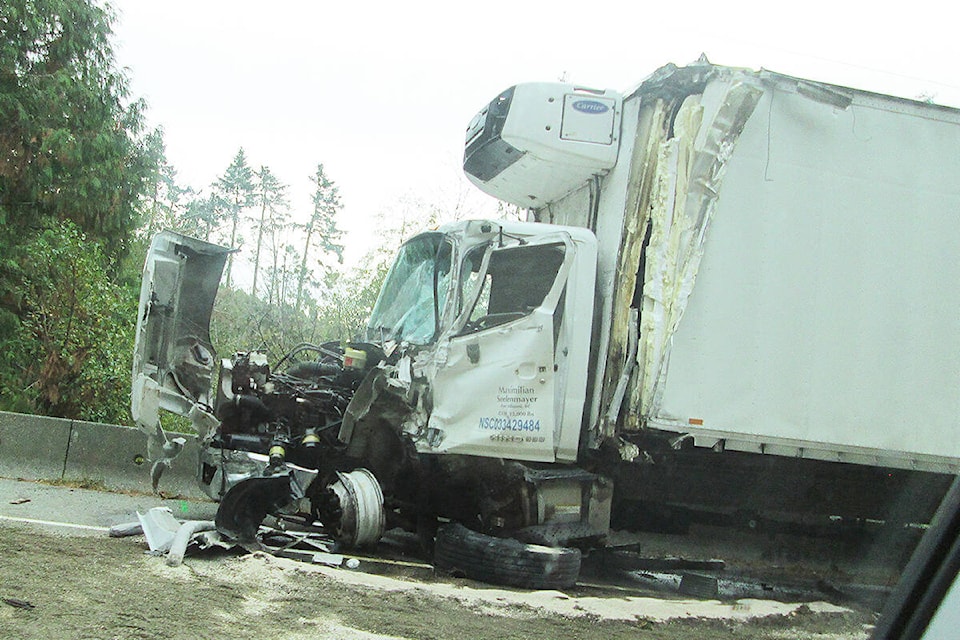 26730954_web1_211013-PQN-Commercial-Truck-Collision-TRUCK_1