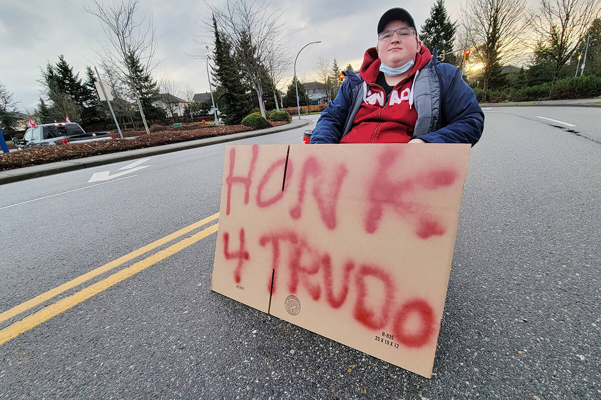 Brad Burns staged a one-man protest against a Langley-based convoy against vaccine mandates and media coverage of the pandemic on Saturday, Feb. 5. (Dan Ferguson/Langley Advance Times)