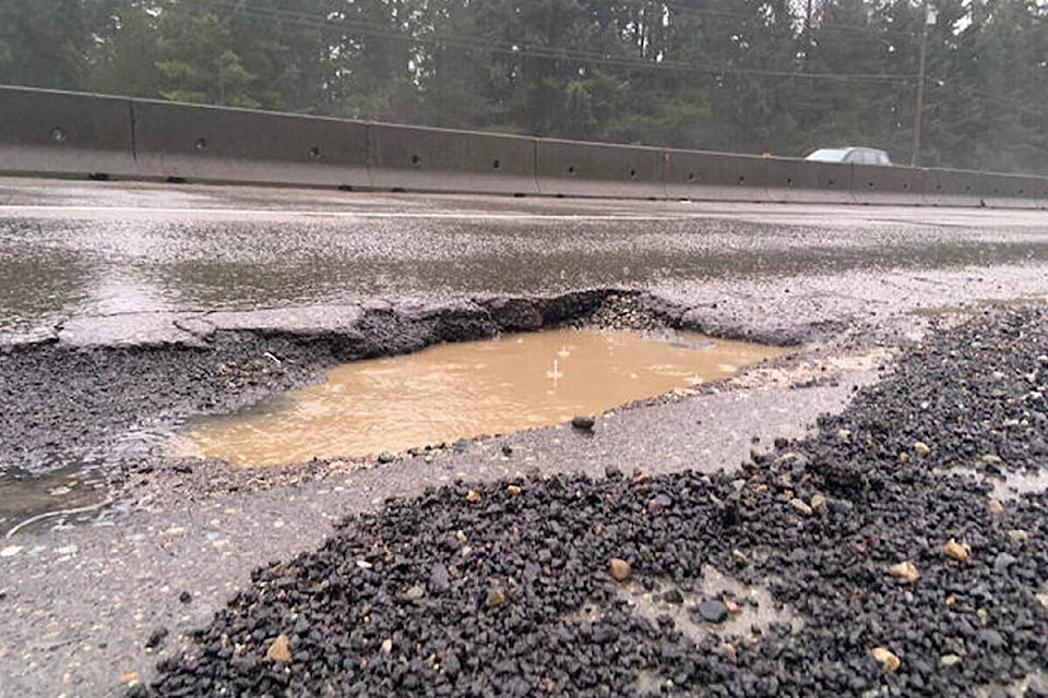 28997895_web1_220119-PQN-Pothole-Repair-POTHOLE_1