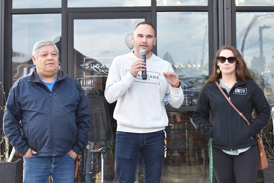 Williams Lake First Nation councillor Chris Wycotte, left, Chief Willie Sellars and councillor Shae Chelsea outside WLFN’s new farm-to-gate cannabis facility during its grand opening Friday, May 6. (Monica Lamb-Yorski photo- Williams Lake Tribune)
